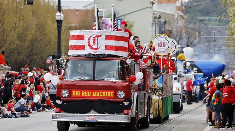 Crowds gathered for the Findlay Market Opening Day Parade Tuesday, April 12, 2022 in downtown Cincinnati before the Reds played their first home game of the season. NICK GRAHAM/STAFF