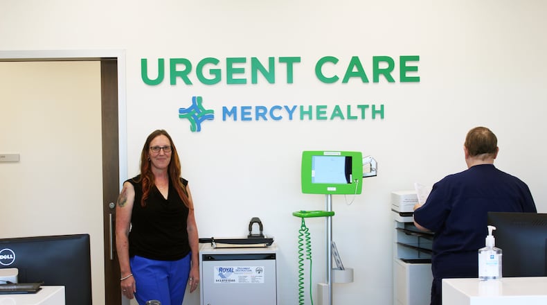 Mercy Health opened its 10th urgent care center at the Jungle Jim’s International Market complex. Katherine Smith, regional operations manager for urgent care is pictured at the front reception area. SUE KIESEWETTER/CONTRIBUTED