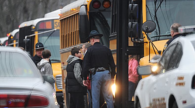 Students at Dennis Intermediate School in Richmond, Indiana, were transferred to Richmond High School Thursday morning, Dec. 13, 2018, where parents were able to pick them up after a 14-year-old boy fatally shot himself inside their school. MARSHALL GORBY/STAFF