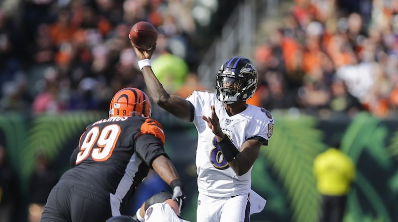 CINCINNATI, OHIO - NOVEMBER 10: Lamar Jackson #8 of the Baltimore Ravens throws a pass against the Cincinnati Bengals during the first quarter of the game at Paul Brown Stadium on November 10, 2019 in Cincinnati, Ohio. (Photo by Silas Walker/Getty Images)