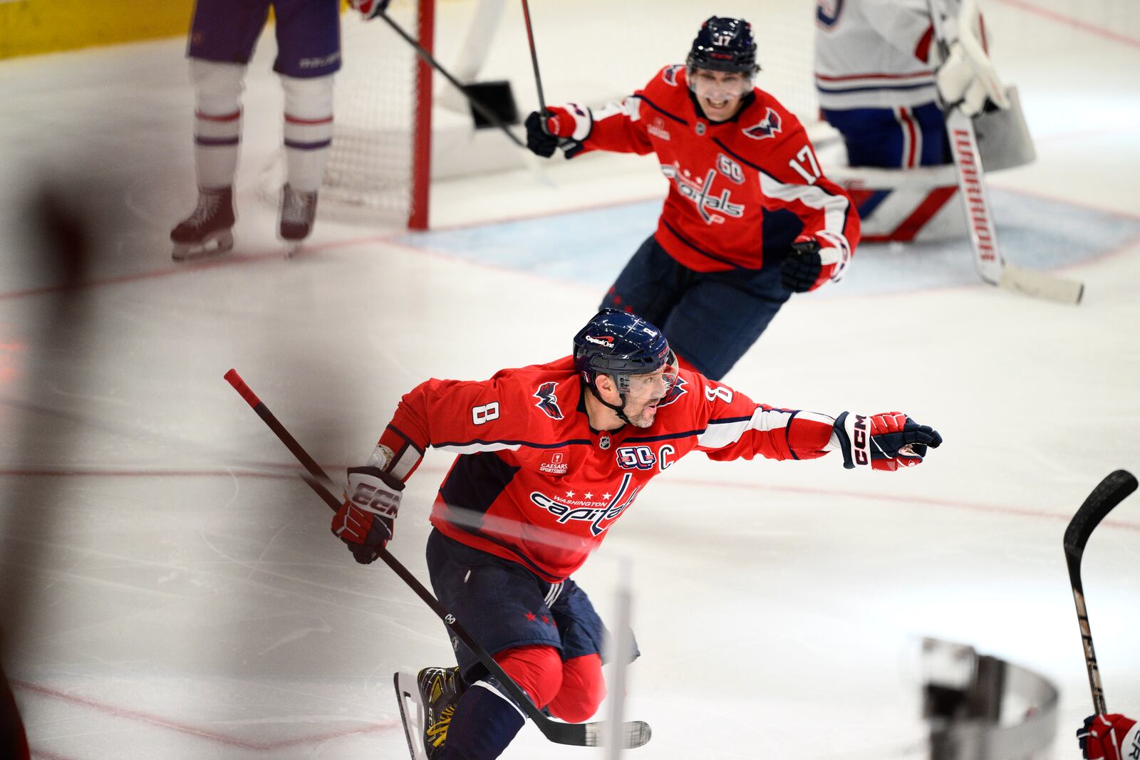 Washington Capitals left wing Alex Ovechkin (8) celebrates after his winning goal in overtime of Game 1 of a first-round NHL hockey playoff series against the Montreal Canadiens, Monday, April 21, 2025, in Washington. (AP Photo/Nick Wass)