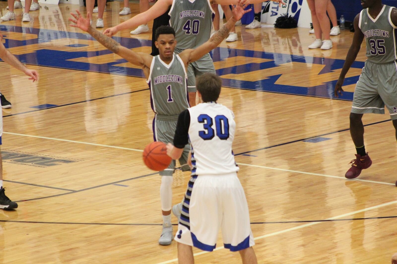 Middletown’s Nelson Rutledge (1) gives Springboro’s Trey Varinsky (30) a defensive look during Saturday night’s game at Springboro. CONTRIBUTED PHOTO BY MARITZA MCKINNEY