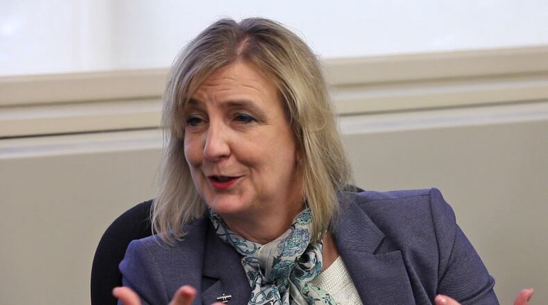 Cheryl Schrader, president of Wright State University, is giving her employees an extra paid day off. TY GREENLEES / STAFF