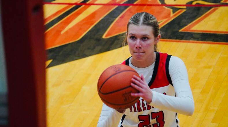 Lakota West's Reese Johnson (23) eyes a free throw attempt against Mason on Monday. Chris Vogt/CONTRIBUTED