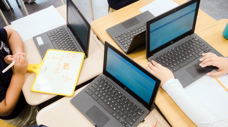 Students work on laptops at First Avenue Elementary School in Newark, N.J., on May 22, 2023. Like many districts,  (Gabriela Bhaskar/The New York Times)