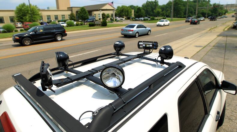 A speed-enforcement van scans traffic along Eaton Avenue in Hamilton. The Hamilton Police Department works with Redflex Traffic Systems to review photographs and video to verify the accuracy of each citation before it is issued.