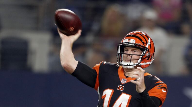 Cincinnati Bengals quarterback Andy Dalton (14) completes a pass in the first quarter against the Cowboys on Saturday, Aug. 18, 2018 at AT&T Stadium in Arlington, Texas. (Bob Booth/Fort Worth Star-Telegram/TNS)