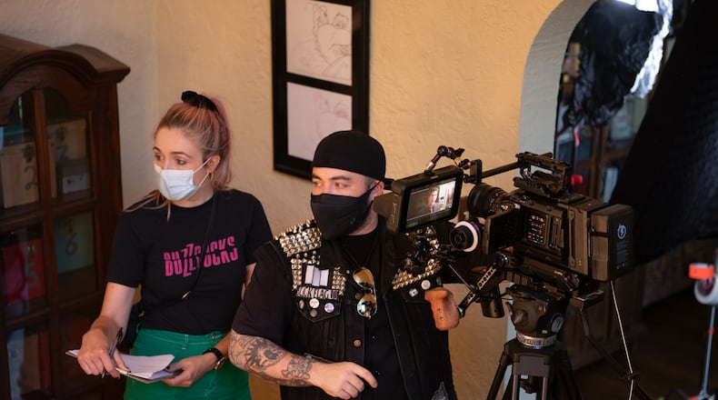 Middletown-native Josh Roush (right), director of “Wrong Reasons,” with his wife, actress-producer Liv Roush, on the set of the independent film. The California transplant's first narrative feature has its Ohio premiere at The Neon in Dayton on Saturday, Feb. 4. CONTRIBUTED