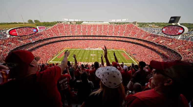 Fans do the tomahawk chop as the Kansas City Chiefs and the Cleveland Browns play during the first half of an NFL football game at Arrowhead Stadium, Sunday, Sept. 12, 2021, in Kansas City, Mo. (AP Photo/Charlie Riedel)