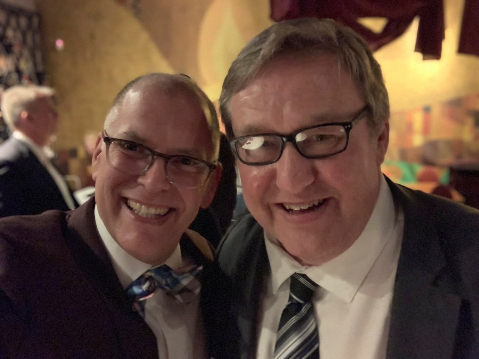 This photo provided by Rick Hodges shows Jim Obergefell, left, and Rick Hodges at an event in Cleveland, Ohio in April 2019. (Rick Hodges via AP)