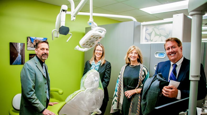 From left to right, Marc Bellisario, Primary Health Solutions, Cynamon Trokhan, Parrish, Marcum & Trokhan Co., LPA, Nanci Lanni, Wilks Family Foundation and Craig Wilks, Wilks Insurance, take a look at the new dental clinic which just opened in downtown Hamilton.