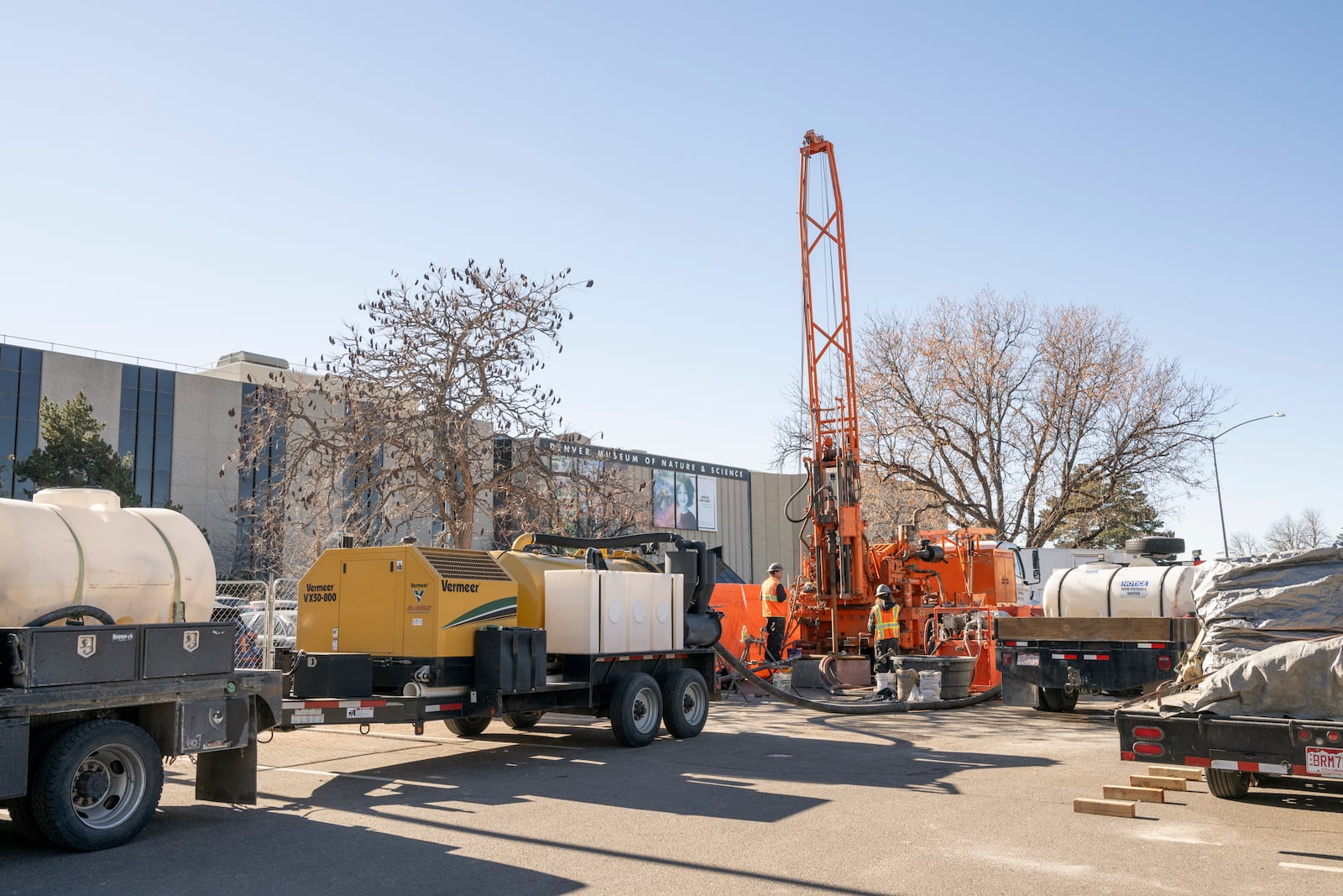 This undated photograph provided by the Denver Museum of Nature and Science shows core drilling used for geothermal feasibility and research to show what lies beneath the museum in the north parking lot at Denver Museum of Nature and Science. (Richard M Wicker/Denver Museum of Nature and Science via AP)
