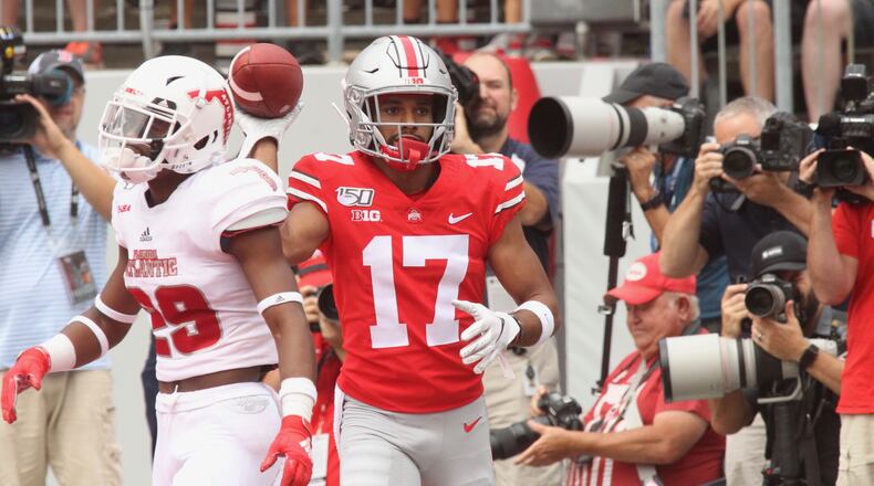 Chris Olave reacts after scoring a touchdown against Florida Atlantic in the 2019 season opener at Ohio Stadium. David Jablonski/Staff