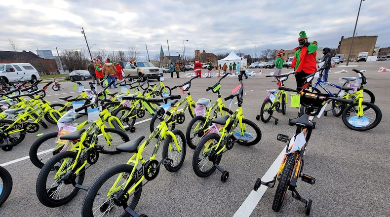 Bikes that were donated by BB Rents were given away to local children two years ago during the 14th annual Louella Thompson's Feed the Hungry Project Toy Giveaway. This year's event is Dec. 17 near Holiday Whopla. NICK GRAHAM/STAFF