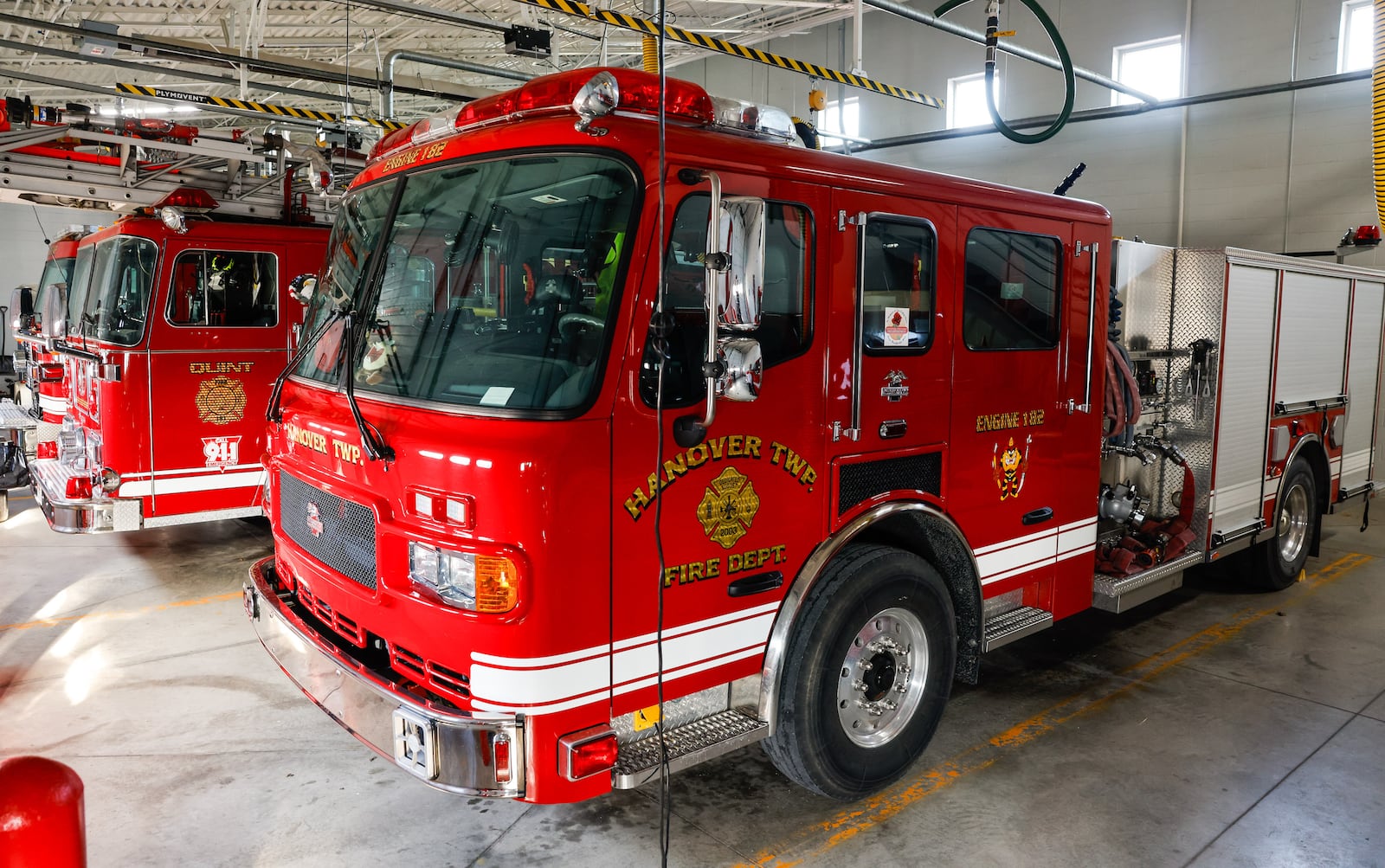 Fire trucks sit inside the Hanover Twp. Fire Station at 1775 Morman Road. The township is putting before voters a 5-mill fire/EMS levy for fire and emergency services on the May 5 ballot to replace a levy set to expire at the end of the year. NICK GRAHAM/STAFF