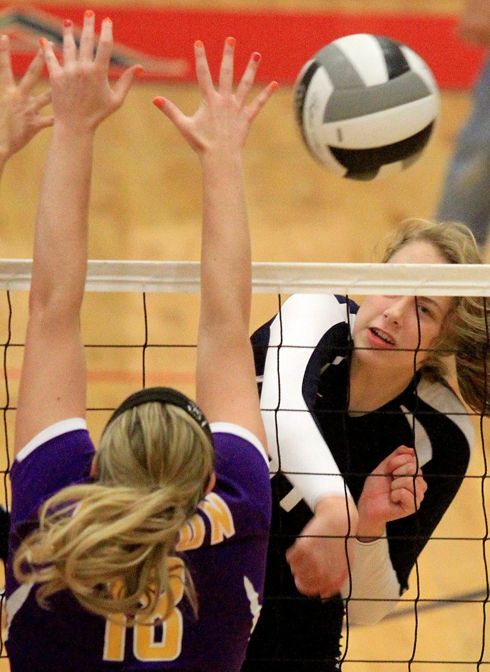 Talawanda’s Valerie Green fires a shot past Eaton’s Julia Titus during their volleyball match in Oxford on Oct. 12, 2015. CONTRIBUTED PHOTO BY E.L. HUBBARD