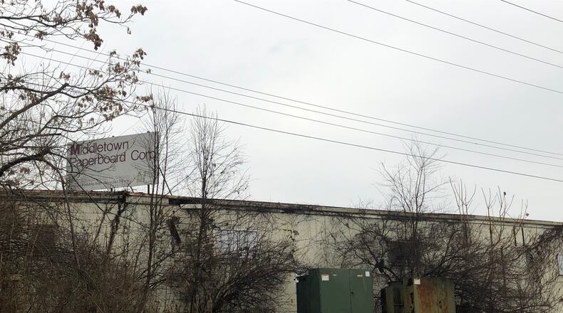 The former Middletown Paperboard property on Verity Parkway was destroyed by fire more than two years ago. The city is applying for $2.8 million in grants to remediate and redevelopment the 14-acre property. RICK McCRABB/STAFF