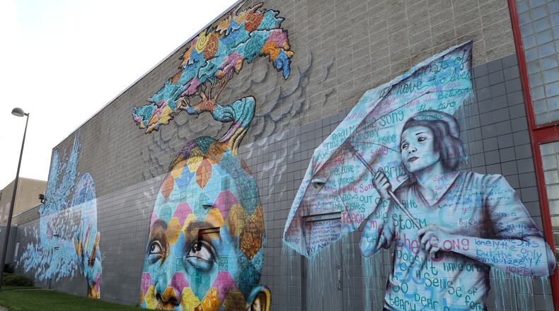 The mural on the side of the Springfield YMCA was created through a partnership between Project Jericho, Springfield Family YMCA and the Clark County Juvenile Court along with artist Joel Bergner. BILL LACKEY/STAFF