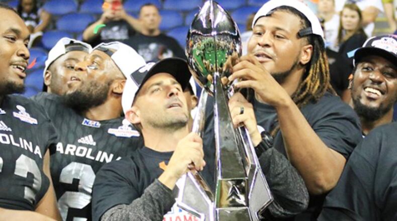 Carolina head coach Billy Back celebrates winning the National Arena League championship last season with a 66-8 victory over the Columbus Lions at the Greensboro Coliseum in Greensboro, N.C. PHOTO COURTESY OF CAROLINA COBRAS