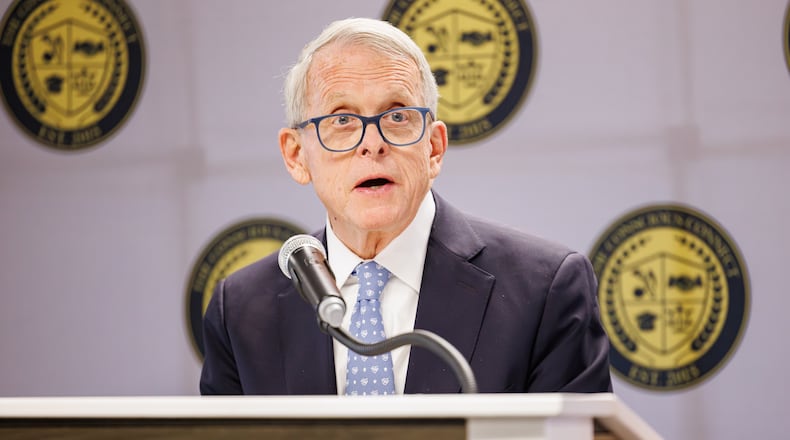Gov. Mike DeWine speaks during a ceremony unveiling a historical marker for Brooks Lawrence on Friday, Nov. 14 at The Dome on South Limestone Street. Lawrence, a Springfield native, broke the color barrier on Miami University's baseball team and for a St. Louis AAA minor league team. He later was a star pitcher with the Reds. BRYANT BILLING/STAFF