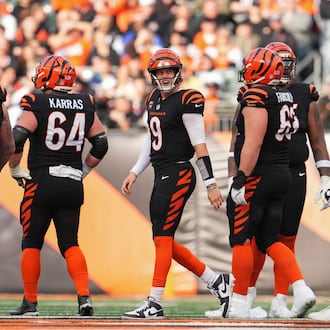 Cincinnati Bengals quarterback Joe Burrow (9) reacts during the first half of an NFL football game against the Arizona Cardinals, Sunday, Dec. 28, 2025, in Cincinnati. (AP Photo/Jeff Dean)