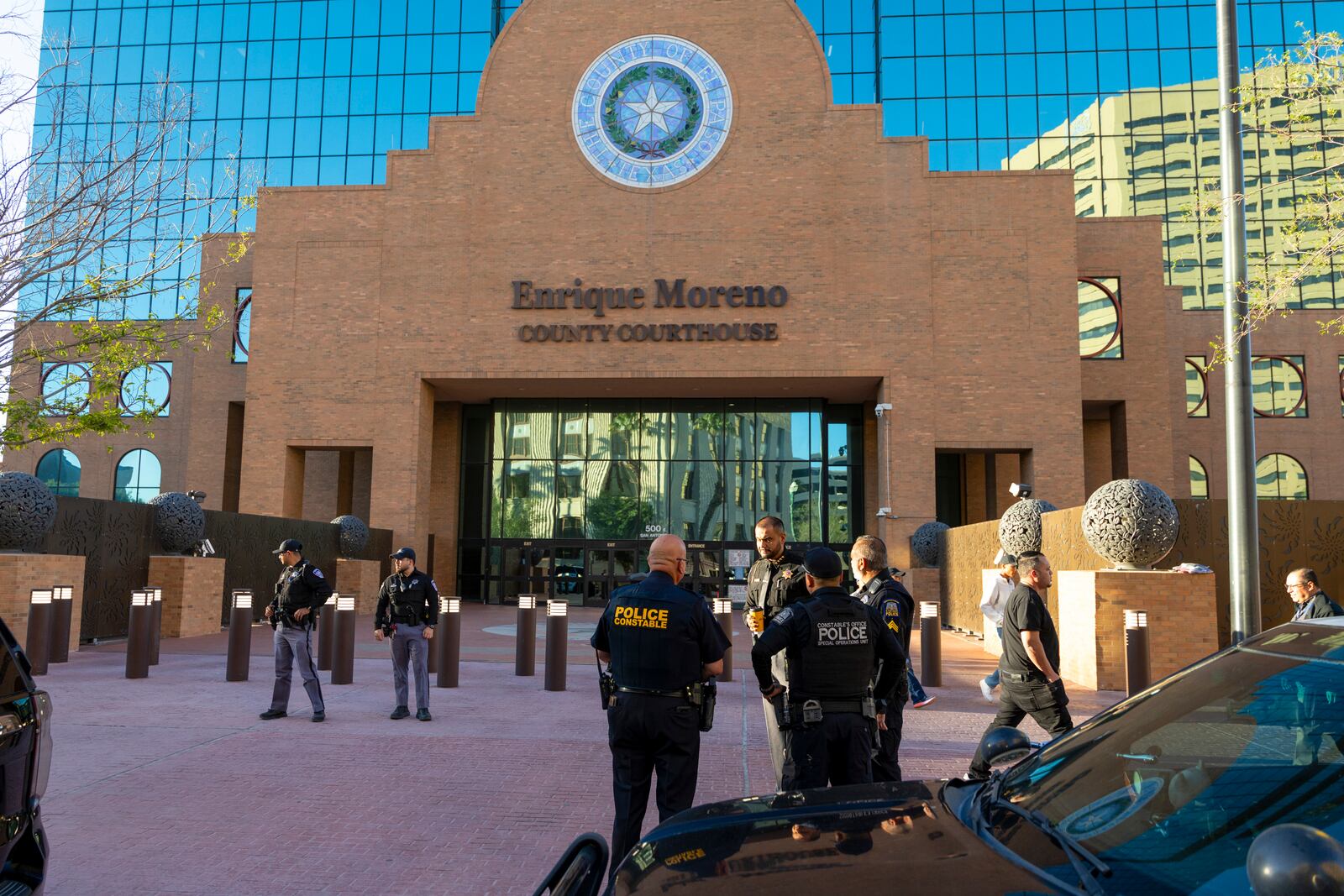A heavy security presence is seen outside the El Paso County Court House on the day Patrick Crusius is set to plea guilty to the Aug. 3. 2019 Walmart Mass shooting that left 23 dead, Monday, April 21, 2025, in El Paso, Texas. (AP Photo/Ivan Pierre Aguirre)