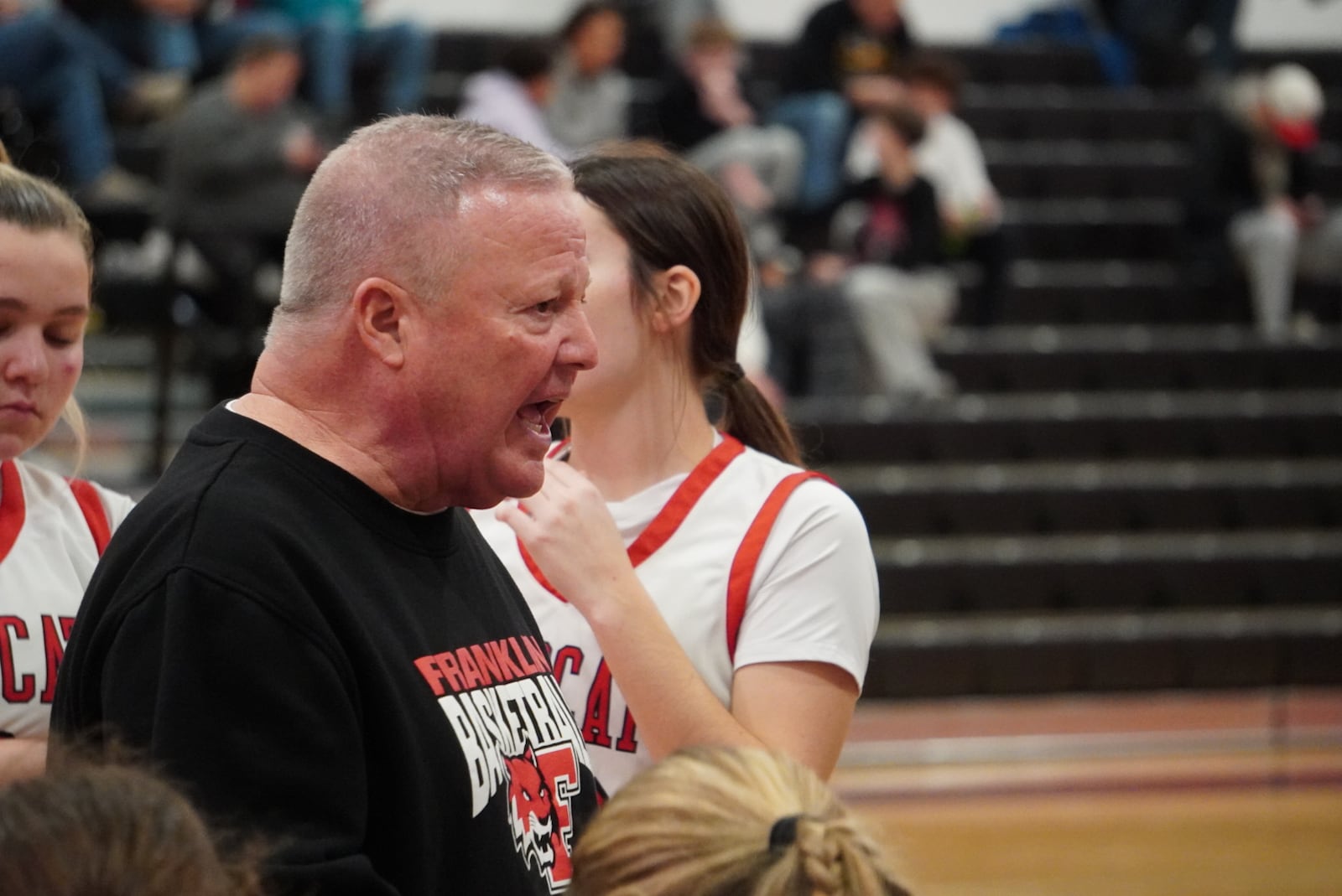 Franklin girls basketball coach John Rossi talks to his players during a timeout against Ross on Saturday. CHRIS VOGT / CONTRIBUTED