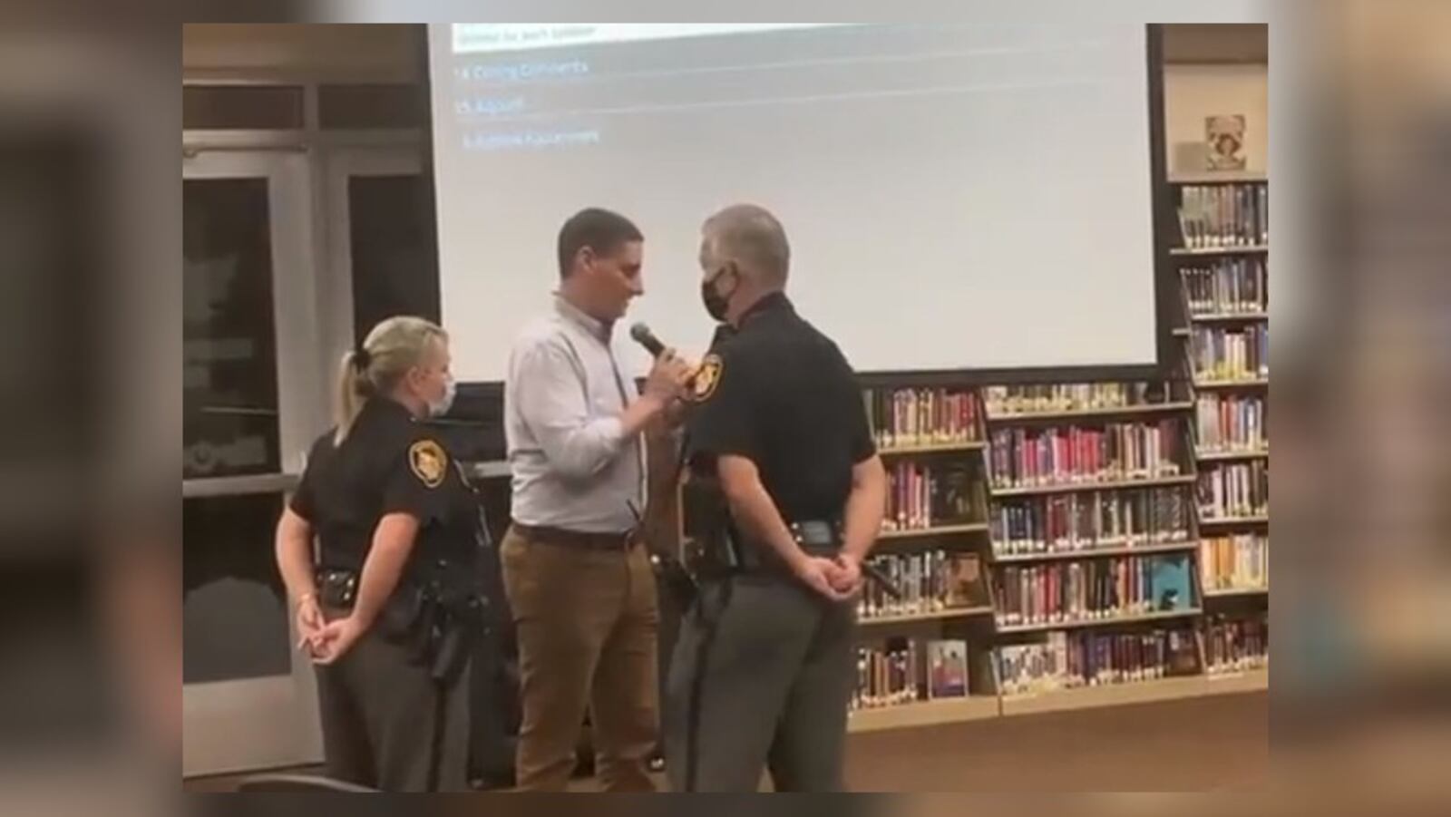 U.S. Senate candidate Josh Mandel was asked to leave the Oct. 11, 2021, school board meeting after he questioned the board on its mask mandate policy. The board cited Mandel was not a resident of the district. Residents or designees of residents are permitted to speak, according to the district. A woman said she designated Mandel to speak on her behalf, but the board said she "yielded" her time and did not formally designate him. SCREEN CAPTURE/TWITTER.COM/JOSHMANDELOHIO