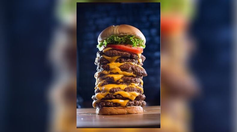 Wayback Burgers at 7690 Voice of America Center Drive in West Chester Twp. is set to host a Triple Triple Challenge on National Cheeseburger Day, Monday, Sept. 18, 2017. CONTRIBUTED