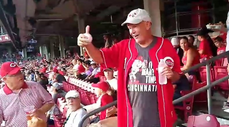 Tom Alf arrives at Great American Ball Park after walking 26 miles from Hamilton to Cincinnati to celebrate his 70th birthday. SUBMITTED PHOTO