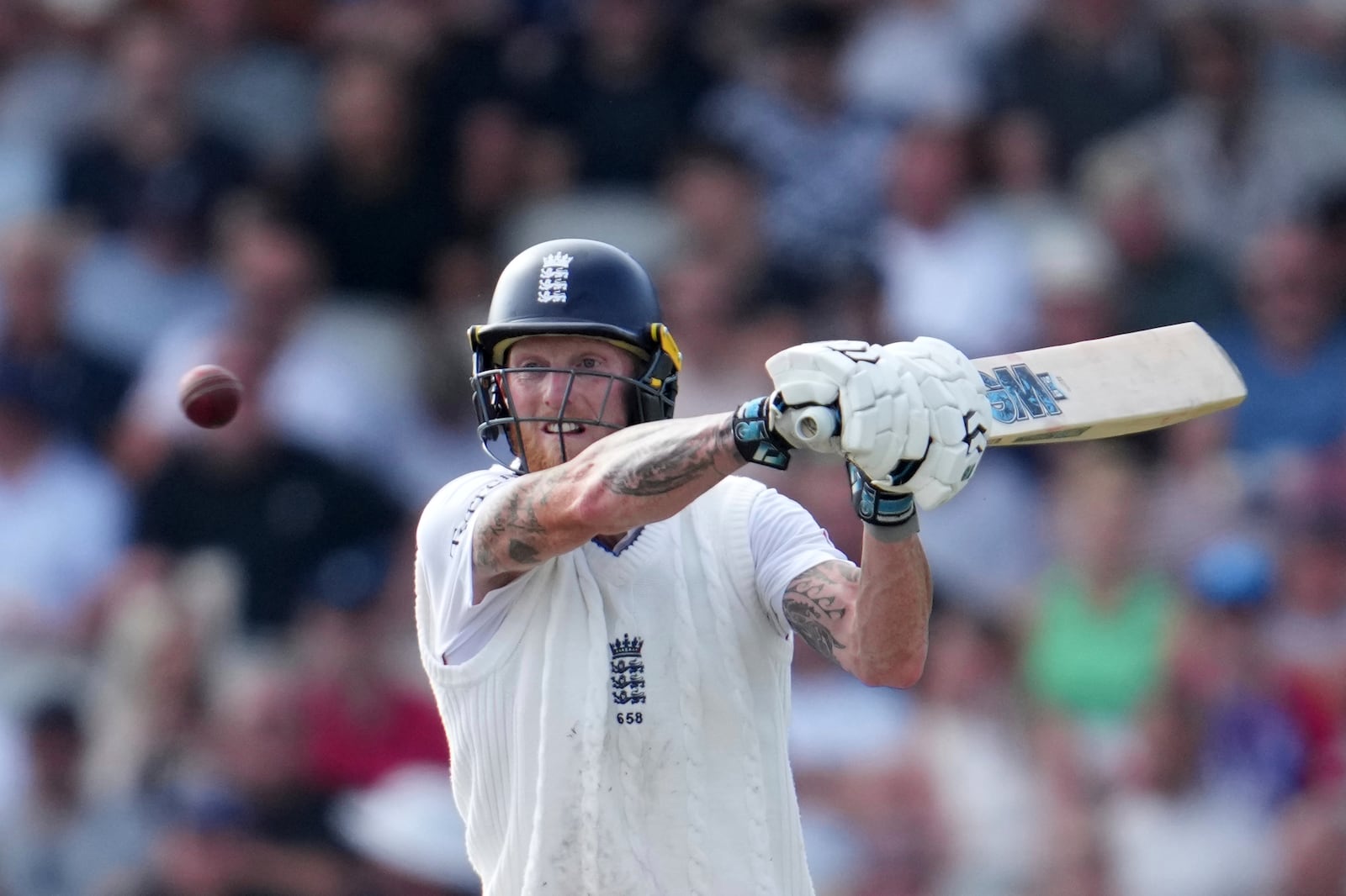 England's captain Ben Stokes plays a shot on the third day of the fourth cricket test match between England and India at Emirates Old Trafford, Manchester, England, Friday, July 25, 2025. (AP Photo/Jon Super)