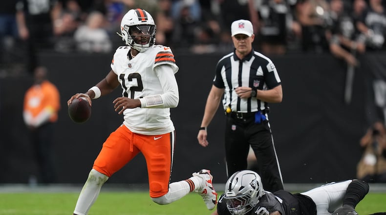 Las Vegas Raiders defensive end Tyree Wilson (9) pressures Cleveland Browns quarterback Shedeur Sanders (12) during the first half of an NFL football game Sunday, Nov. 23, 2025, in Las Vegas. (AP Photo/Eric Gay)