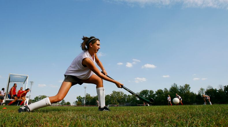 In this 2010 file photo, Talawanda players workout during field hockey practice at the high school. The district’s Supplemental Review Committee has suggested the school board eliminate field hockey and add girls golf to the high school’s sports offerings. NICK GRAHAM/STAFF