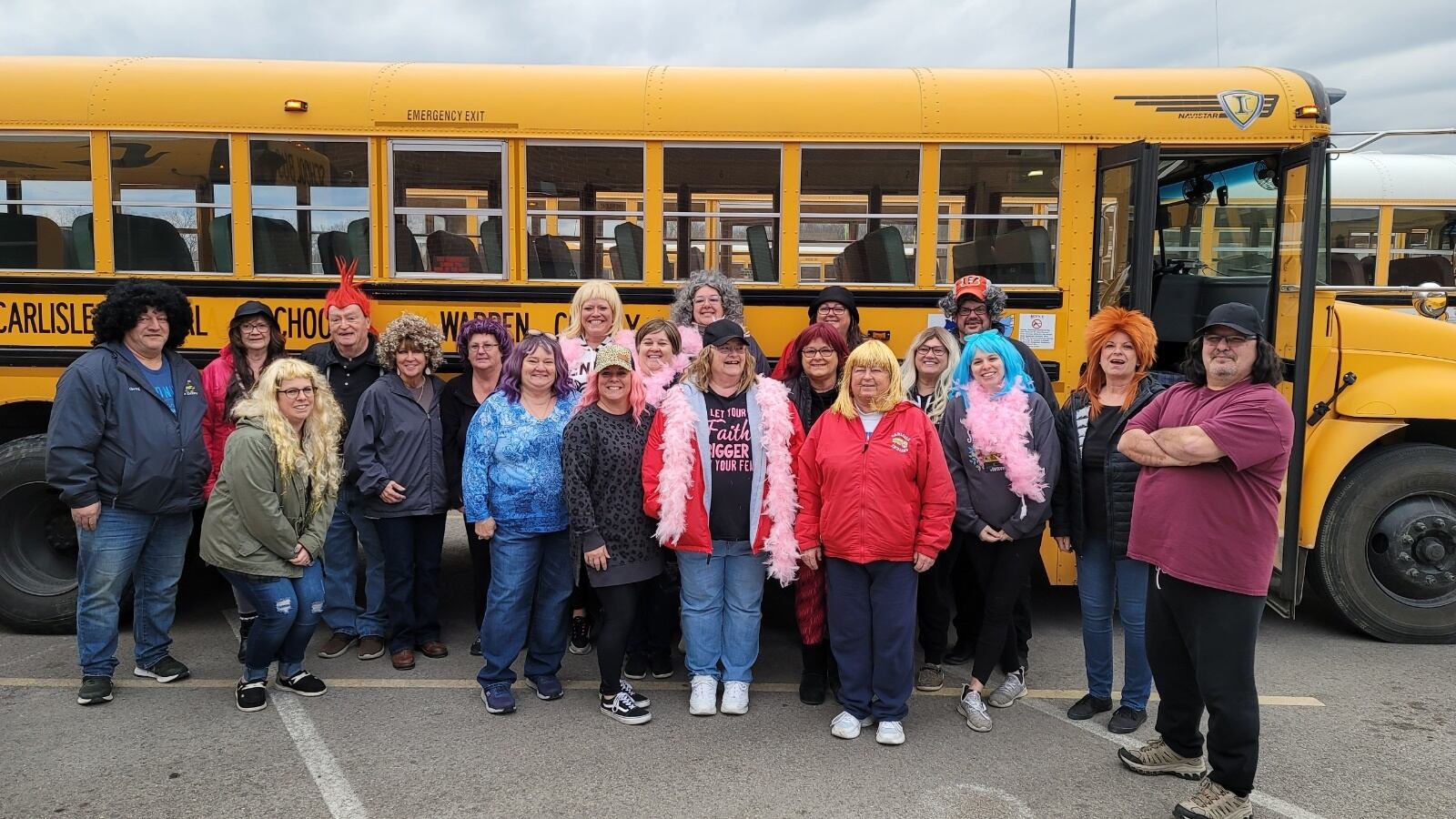 Numerus Carlisle bus drivers, as a show of support for a co-worker battling breast cancer, wore wigs to work when Gail Harvey returned to work on Feb. 7. Harvey is pictured in the middle of the front row wearing a black baseball cap and wig. SUBMITTED PHOTO