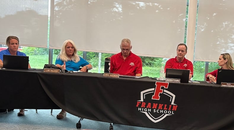 Franklin City Schools Board of Education discusses an income tax levy for the Nov. 4 ballot during a Monday, July 7, 2025, special meeting at Franklin High School. From left are board members Ashley Blevins, Lori Raleigh, Chris Sizemore, Andrew Fleming and Rachel Ruppert-Wolfinbarger. JEN BALDUF/STAFF