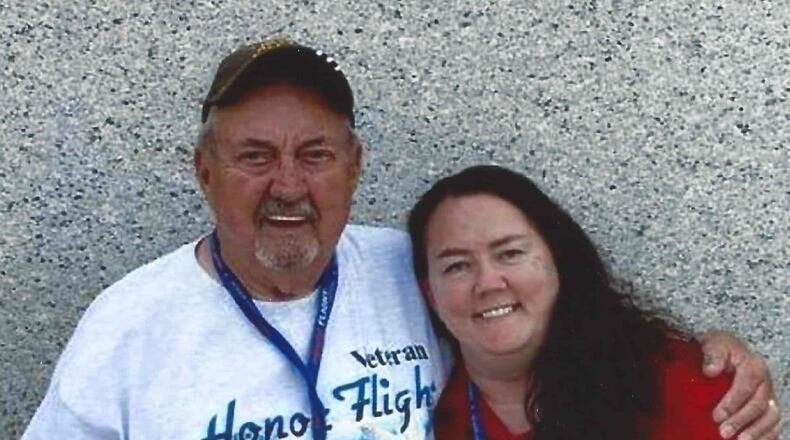 Bernie Coppock and his daughter Kelly in front of the Ohio Pillar at the World War II Memorial during an Honor Flight tour to Washington, D.C. CONTRIBUTED