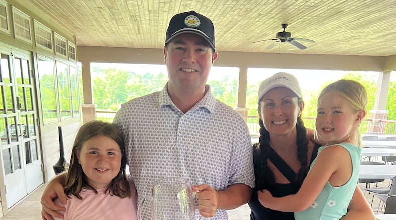 Kyle Hodges won his fifth straight Hamilton City Golf Championship and 10th overall. Hodges is pictured with his wife Kristi and daughters Harper and Hannah. CONTRIBUTED