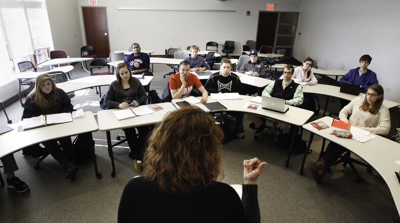 File photo of students learning how to apply for financial aid. CHRIS STEWART / STAFF