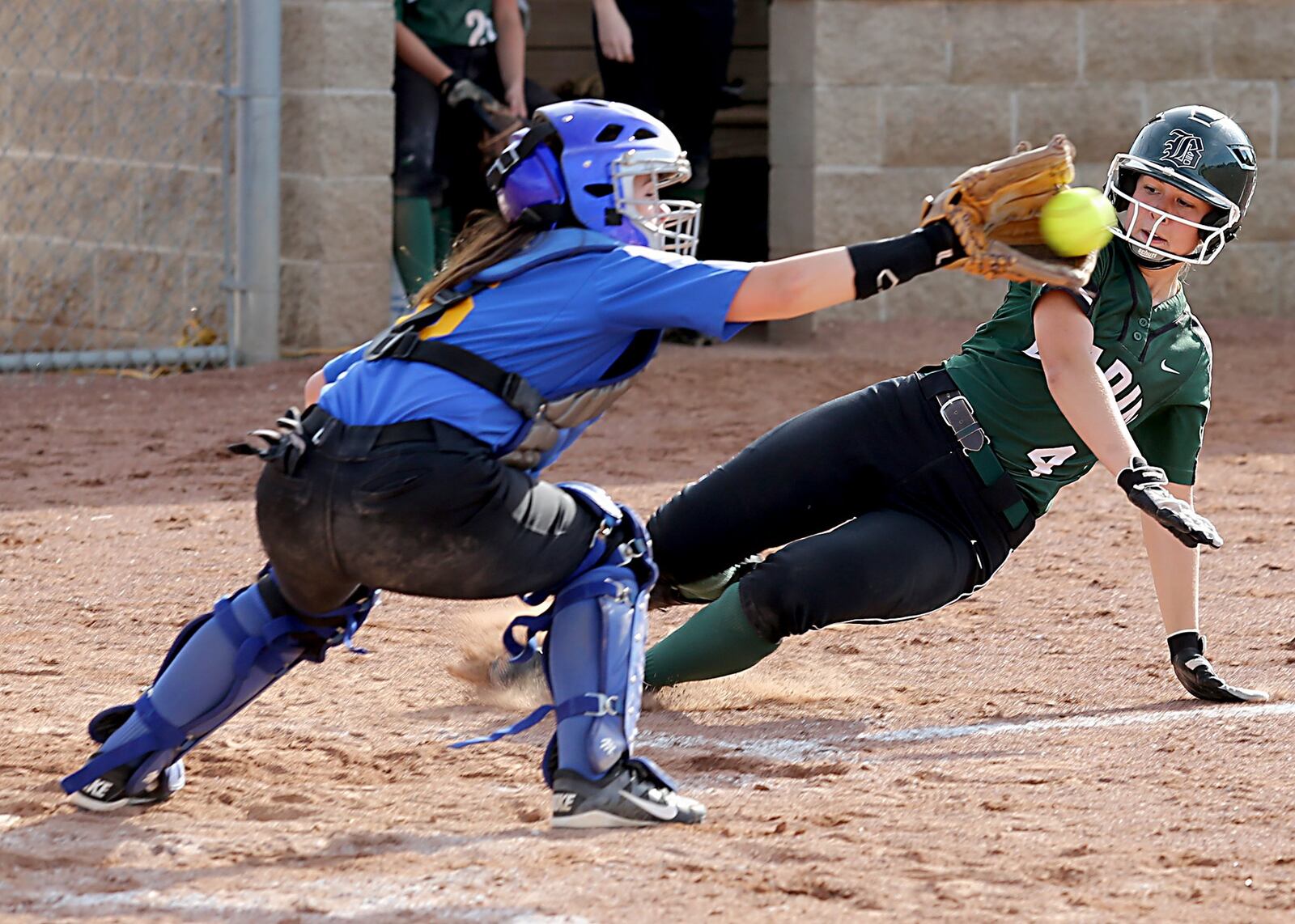 Badin’s Lauren Moser is tagged out by Clermont Northeastern catcher Kayla Nichols during their Division III district final at Kings on Monday. CONTRIBUTED PHOTO BY E.L. HUBBARD