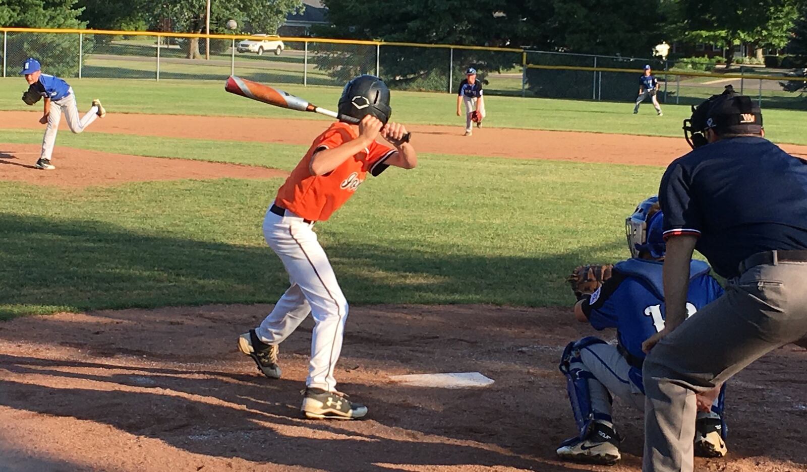 Hamilton West Side’s Sam Floyd delivers a pitch to Ironton’s Connor Kleinman during Wednesday night’s Ohio Little League Tournament game at the Hoover Community Recreation Complex in North Canton. West Side earned a 13-3 win in five innings. RICK CASSANO/STAFF