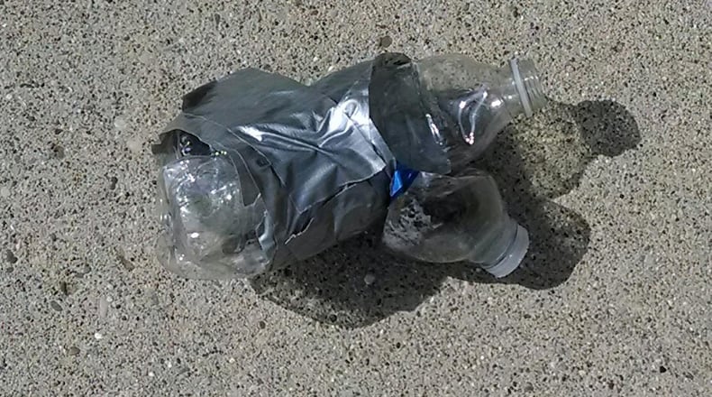 The remains of a chemical-filled, pop-bottle bomb that exploded in the driveway of a home in the 5200 block of Aspen Valley Drive the morning of Thursday, April 10.
