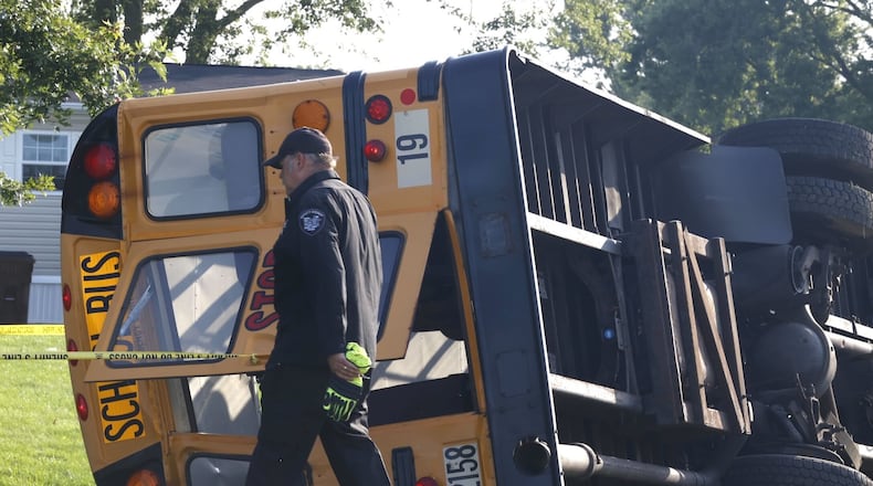 At least one person was killed after a Northwestern school bus was involved in a crash on Route 41 in German Twp. Tuesday, Aug. 22, 2023. BILL LACKEY/STAFF