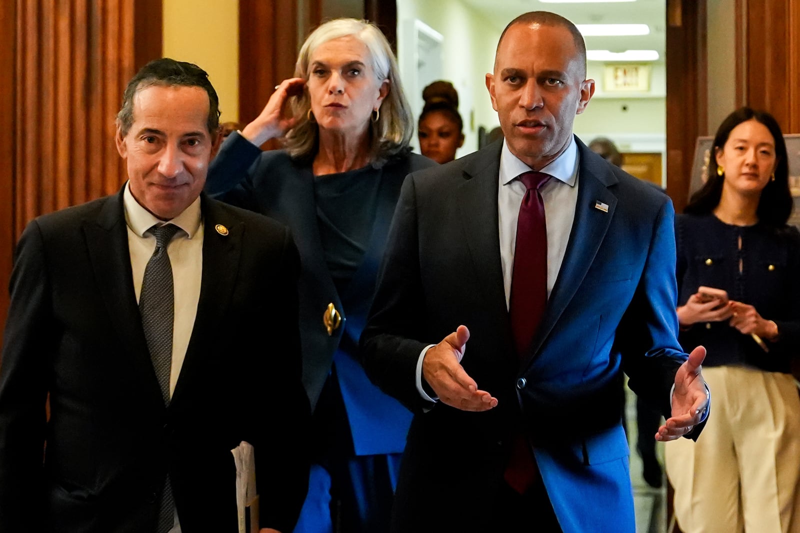 House Minority Leader Hakeem Jeffries, D-N.Y., right, leaves his office with Rep. Jamie Raskin, D-Md., left, and Rep. Katherine Clark, D-Mass., center, shortly after speaking in the House chamber during the final vote for President Donald Trump's signature bill of tax breaks and spending cuts, Thursday, July 3, 2025, at the Capitol in Washington. (AP Photo/Julia Demaree Nikhinson)
