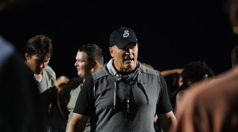 Lakota East coach Jon Kitna directs practice on Wednesday, July 24, at Lakota East High School. Chris Vogt/CONTRIBUTED