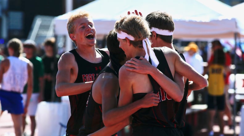 Fort Loramie celebrates after winning the 4x800 relay in the Division III state track championship on Friday, June 3, 2022, at Jesse Owens Memorial Stadium in Columbus. David Jablonski/Staff