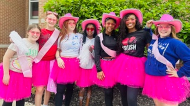 Anedra Million, 51, of Middletown, second from right, recently was crowned Mrs. Ohio America. She will compete in the Mrs. America pageant next month in Las Vegas. She hopes her win inspires her students who attend Highview Sixth Grade Center in Middletown. SUBMITTED PHOTO