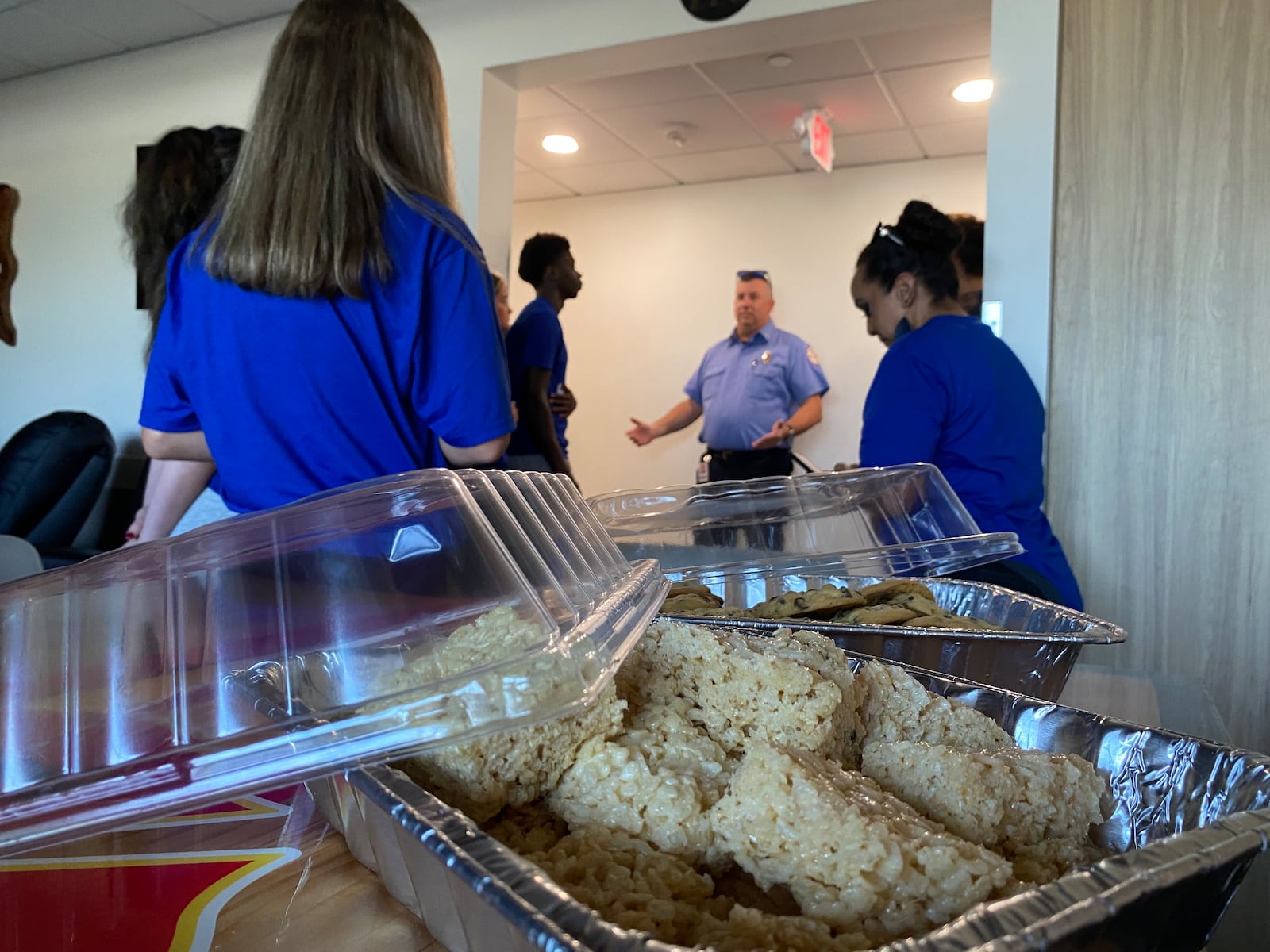 First-responders in Middletown got surprise visits and snacks Thursday as part of a 9/11 commemoration and outreach program by local a Christian high school. Students from Middletown Christian Schools High School continued their tradition of recent years by baking and then delivering their hand-made snacks to the city’s fire and police stations. (Photo By Michael D. Clark/Journal-News)