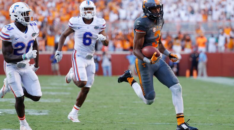 KNOXVILLE, TN - SEPTEMBER 24: Josh Malone #3 of the Tennessee Volunteers runs into the end zone with a 42-yard touchdown reception against the Florida Gators in the fourth quarter at Neyland Stadium on September 24, 2016 in Knoxville, Tennessee. Tennessee defeated Florida 38-28. (Photo by Joe Robbins/Getty Images)
