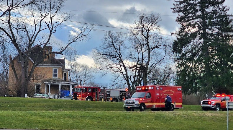 Middletown firefighters and departments from surrounding cities were a the scene of a Tytus Avenue house fire for several hours Wednesday. NICK GRAHAM/STAFF
