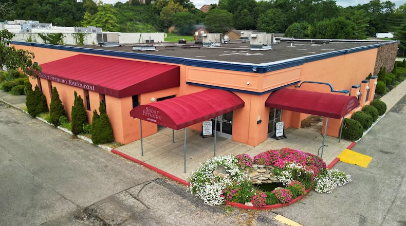 Fairfield Police, along with ICE and the Butler County Sheriff's Office, arrested 34 people during an operation at Sabor Peruano Night Club, 7245 Dixie Highway, on Saturday, Aug. 16, 2025. Five additional people were arrested during traffic stops. Pictured is Sabor Peruano on Thursday afternoon, Aug. 21, 2025. NICK GRAHAM/STAFF